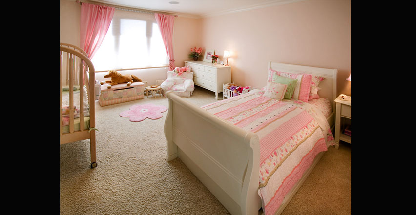 Architectural photography showing interior pretty pink child’s bedroom