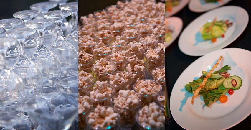 Event photography showing wine glasses, popcorn, salad service at charity fundraiser in San Diego California
