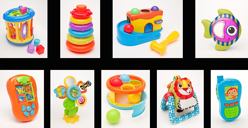 Product catalog photography of various children and infant toys at Oceanside Photographics studio
